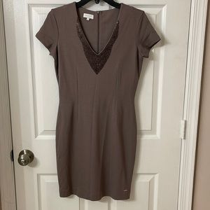 A European brand dress size 4, brand new without tag